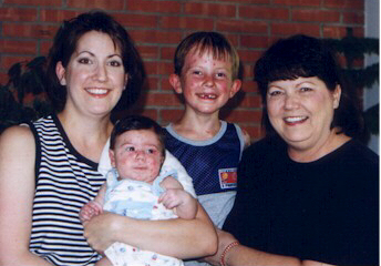 Tammy on the left and grandma Linda on the right with Christopher, 6 and Jeffrey, 3 months, JEB-NH