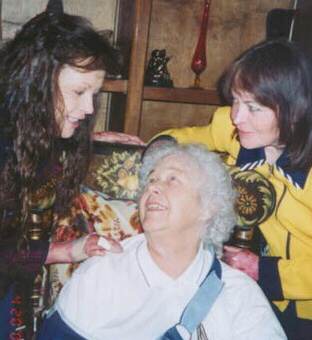 Debbie Kay, RDEB, and Dianna, RDEB, surround their precious mom...